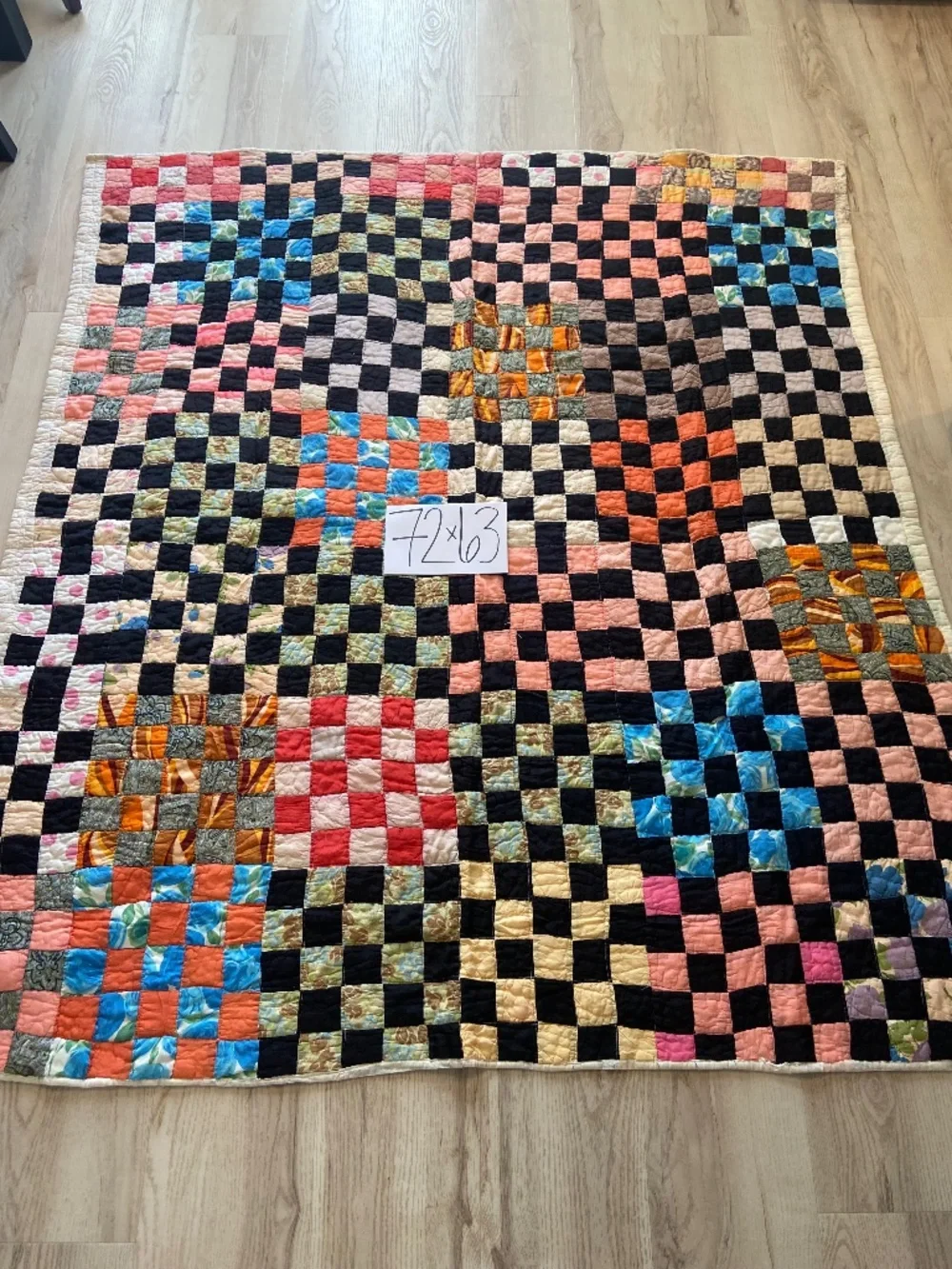 Handmade colorful vintage postage stamp quilt